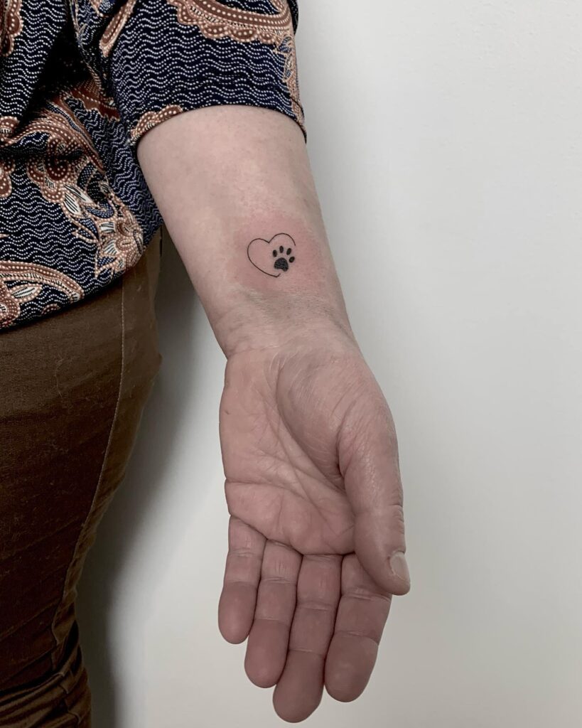 Fineline Heart with Dog Paw Tattoo on the Inner Wrist: Feminine Wrist Whimsy