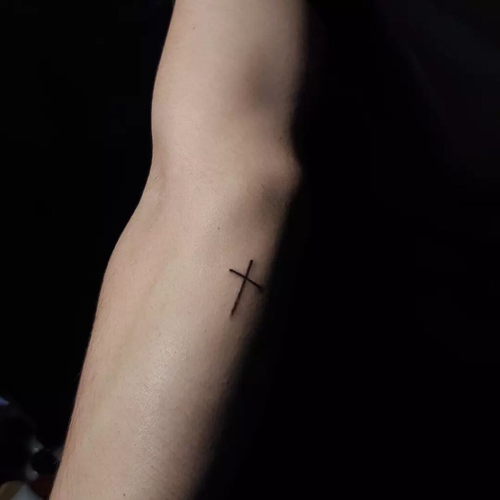 Fineline outer forearm tattoos for females cross simple tattoo