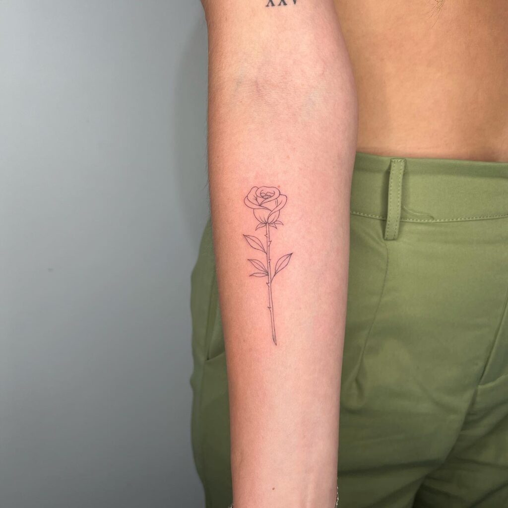 Fineline Rose Tattoo on the Forearm: Eternal Bloom