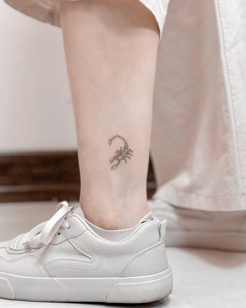 Fineline Scorpio Tattoo Above the Ankle for Females: Zodiac Elegance