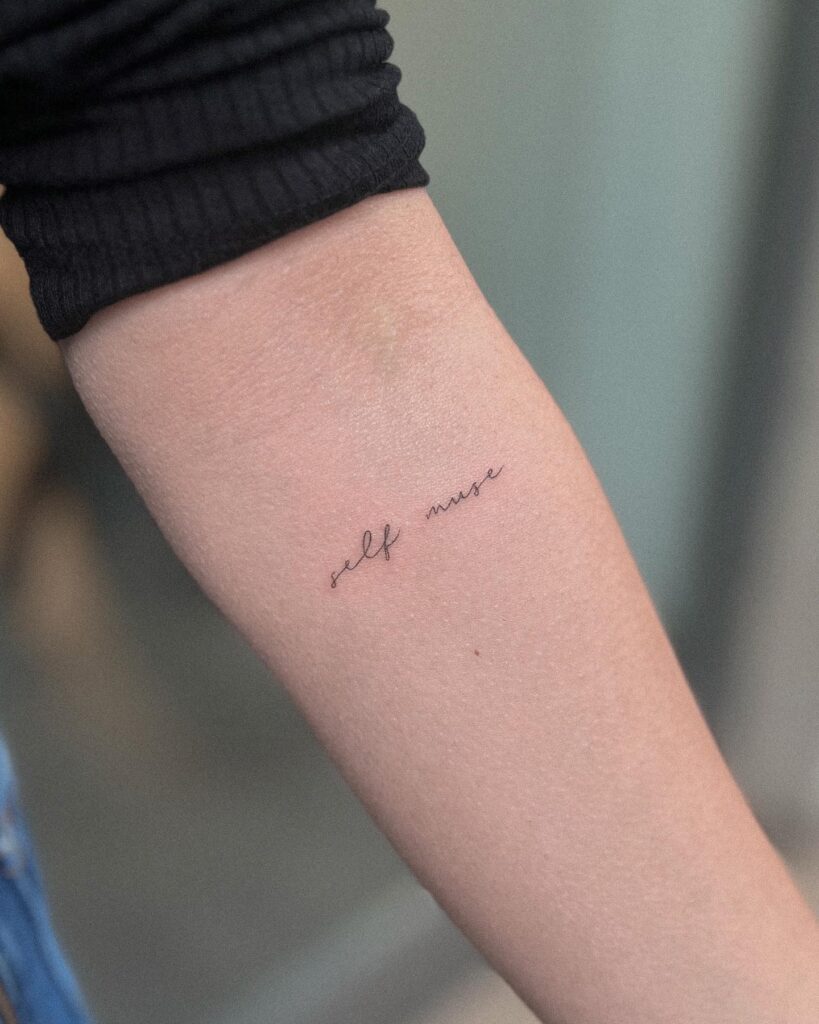 Fineline Script Lettering Tattoo on the Forearm: 'Self Muse' Elegance