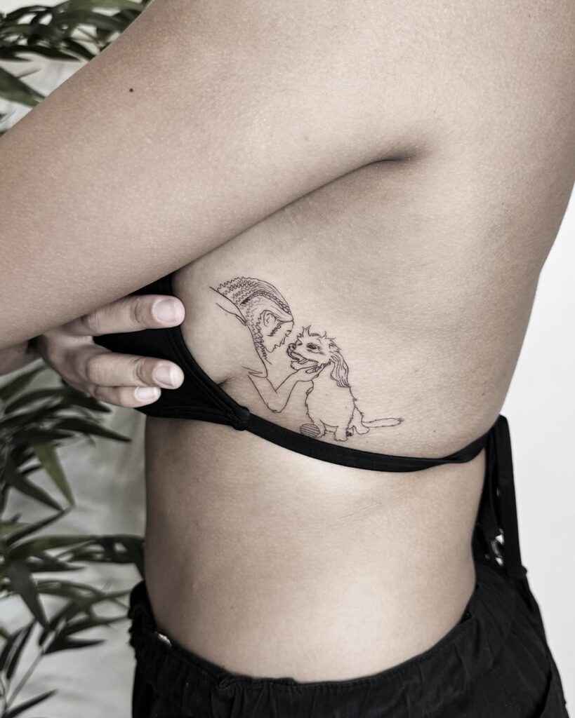 Fineline Tattoo of a Pet Mom and Puppy on the Rib for a Heartfelt Tribute: Pet Mom's Pride