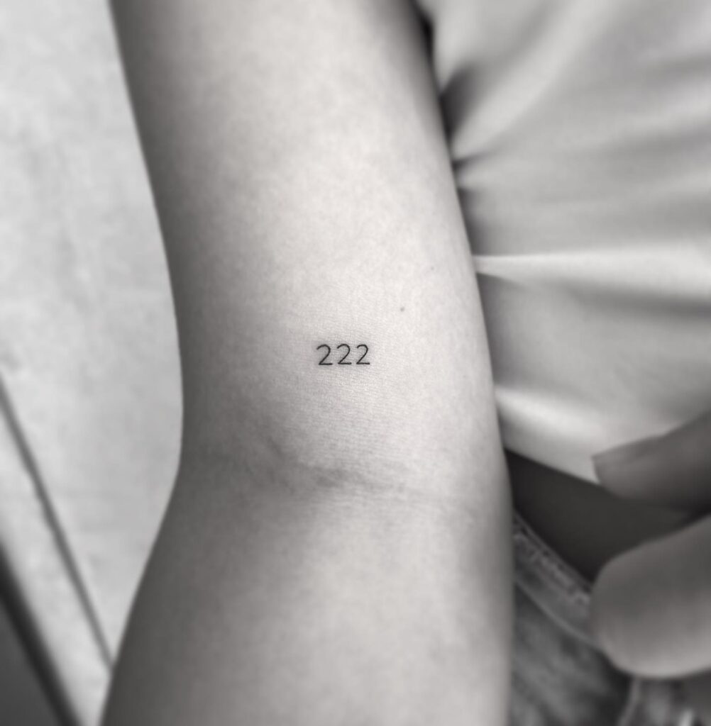 Fineline Tiny 222 Tattoo on the Above the Elbow for Females, a Subtle Symbol: Tiny Treasures 