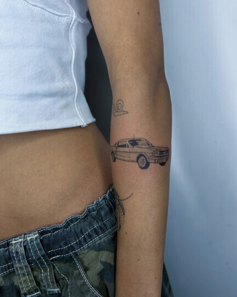 Finely Detailed Black Ink Classic Muscle Car Tattoo on Inner Forearm – Car Tattoo Ideas