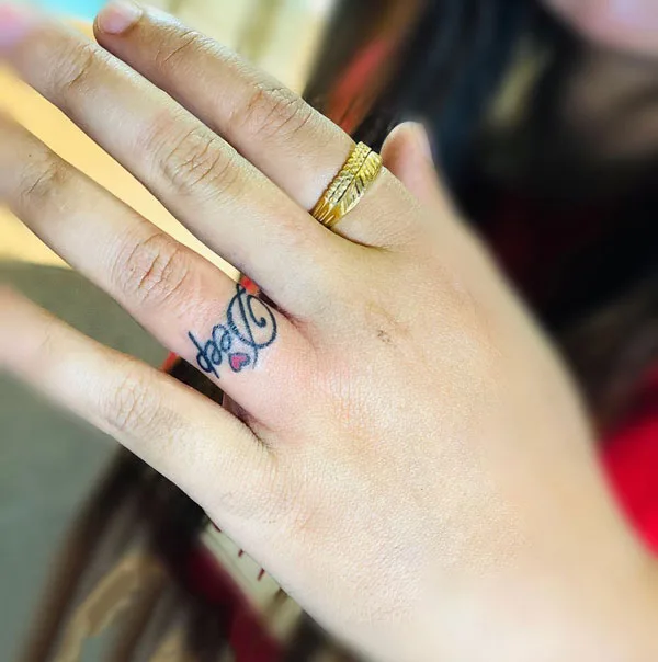 Finger name tattoo