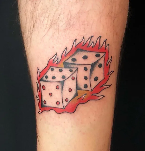 Flaming dice tattoo