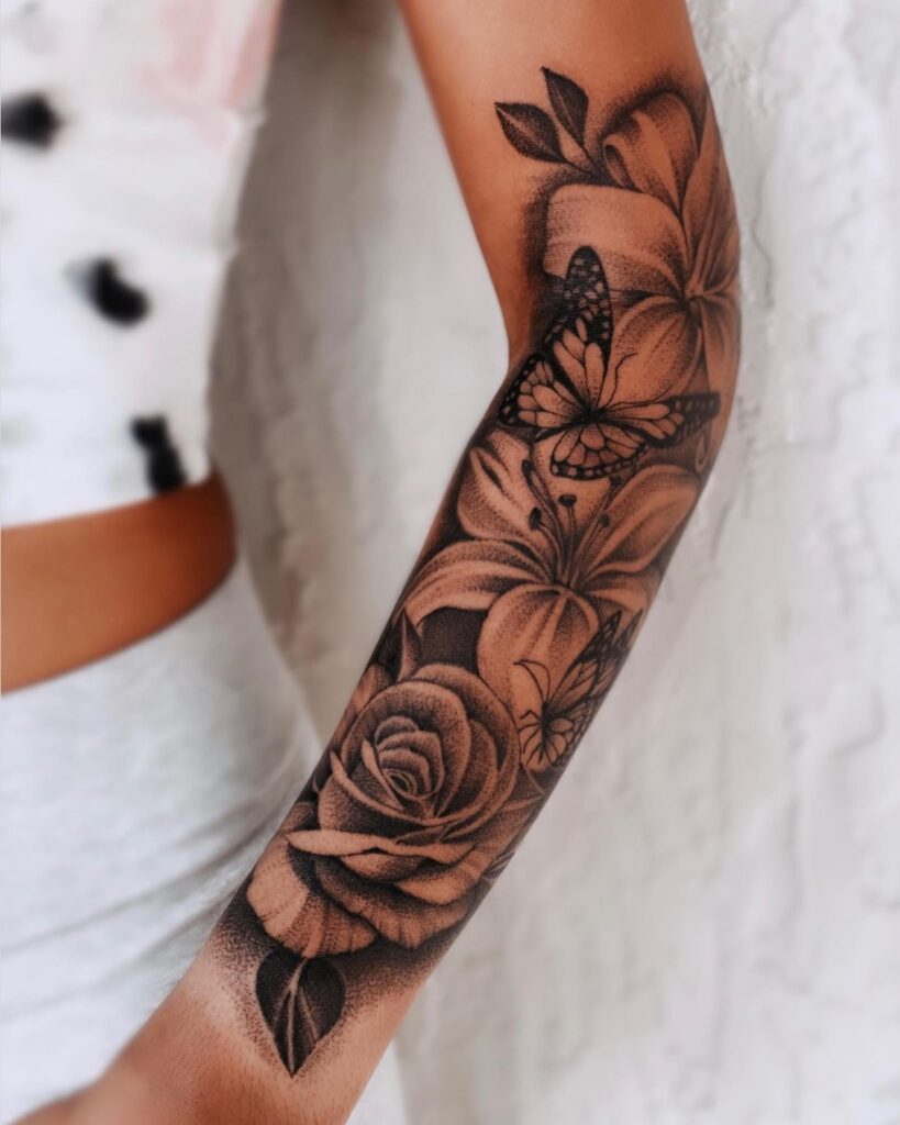 Floral and rosy delight lower half sleeve tattoo with butterflies