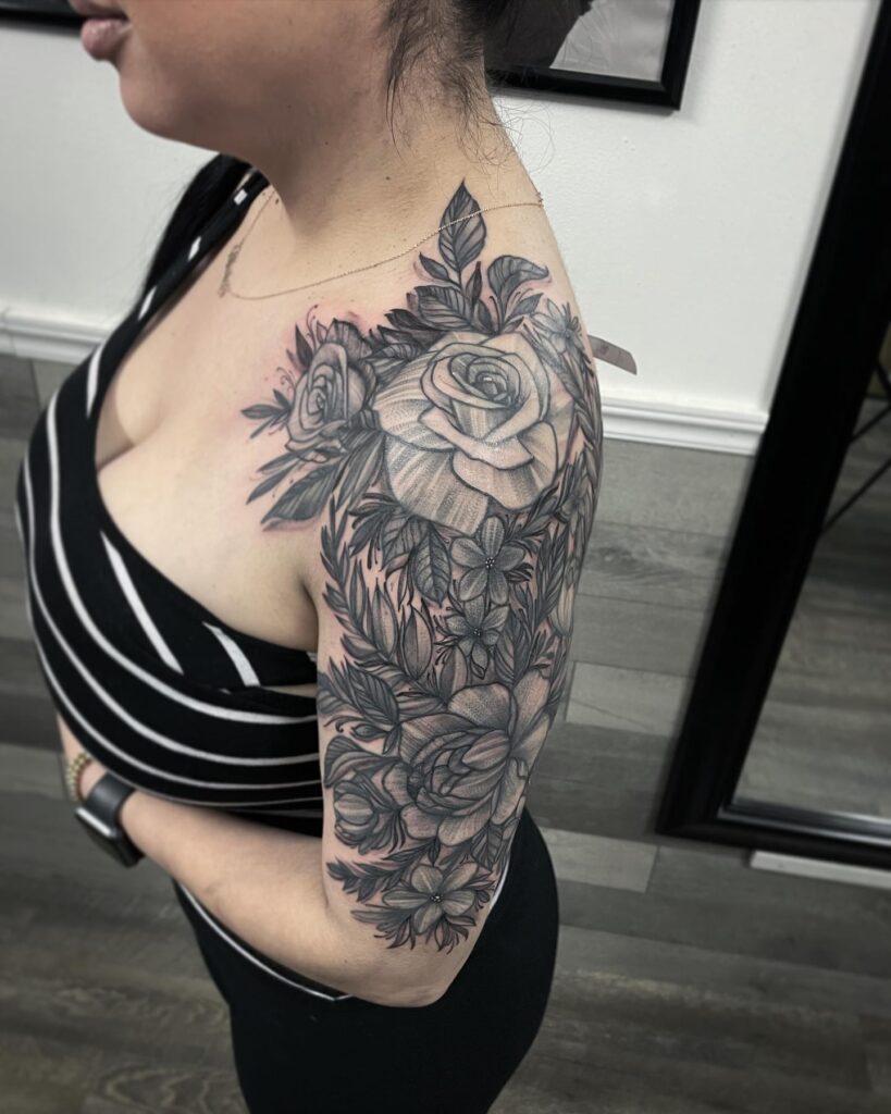 Floral arm and rose half sleeve arm and shoulder tattoo nature's delicate adornment