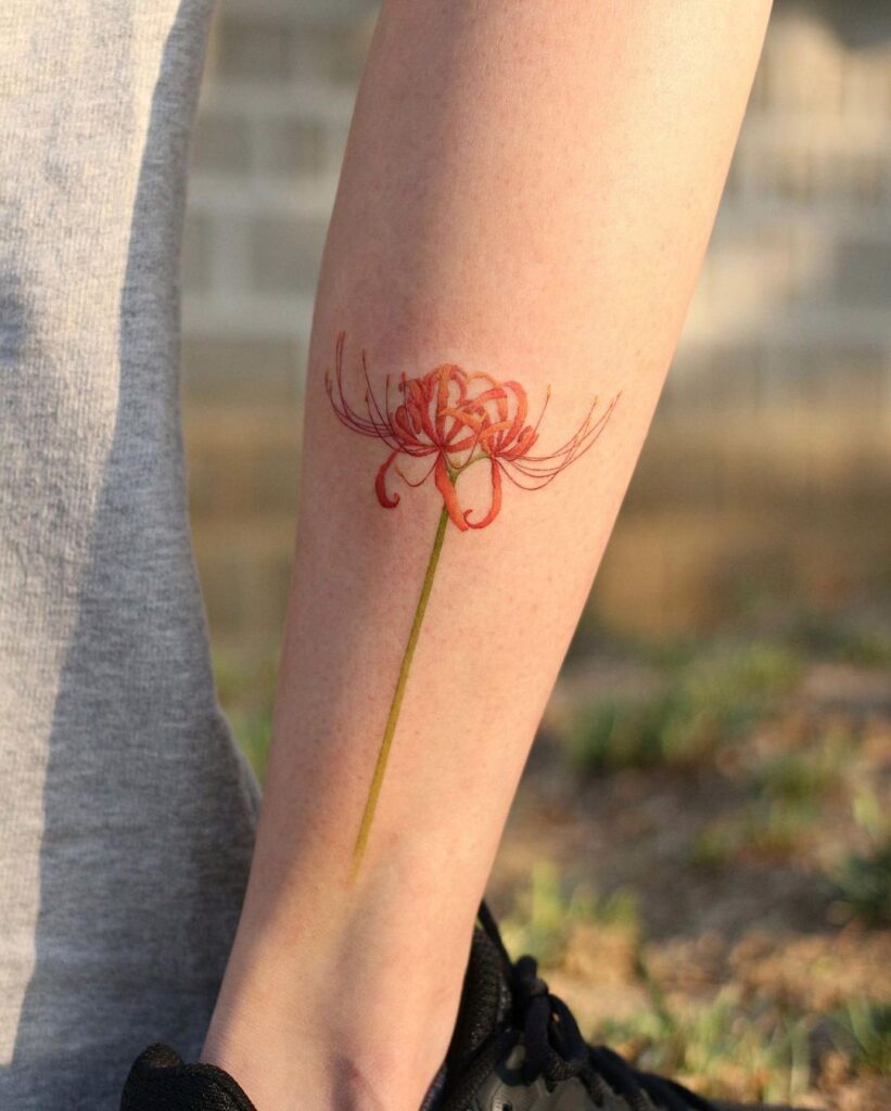 Floral grace captured spider lily calf tattoo design ideas 