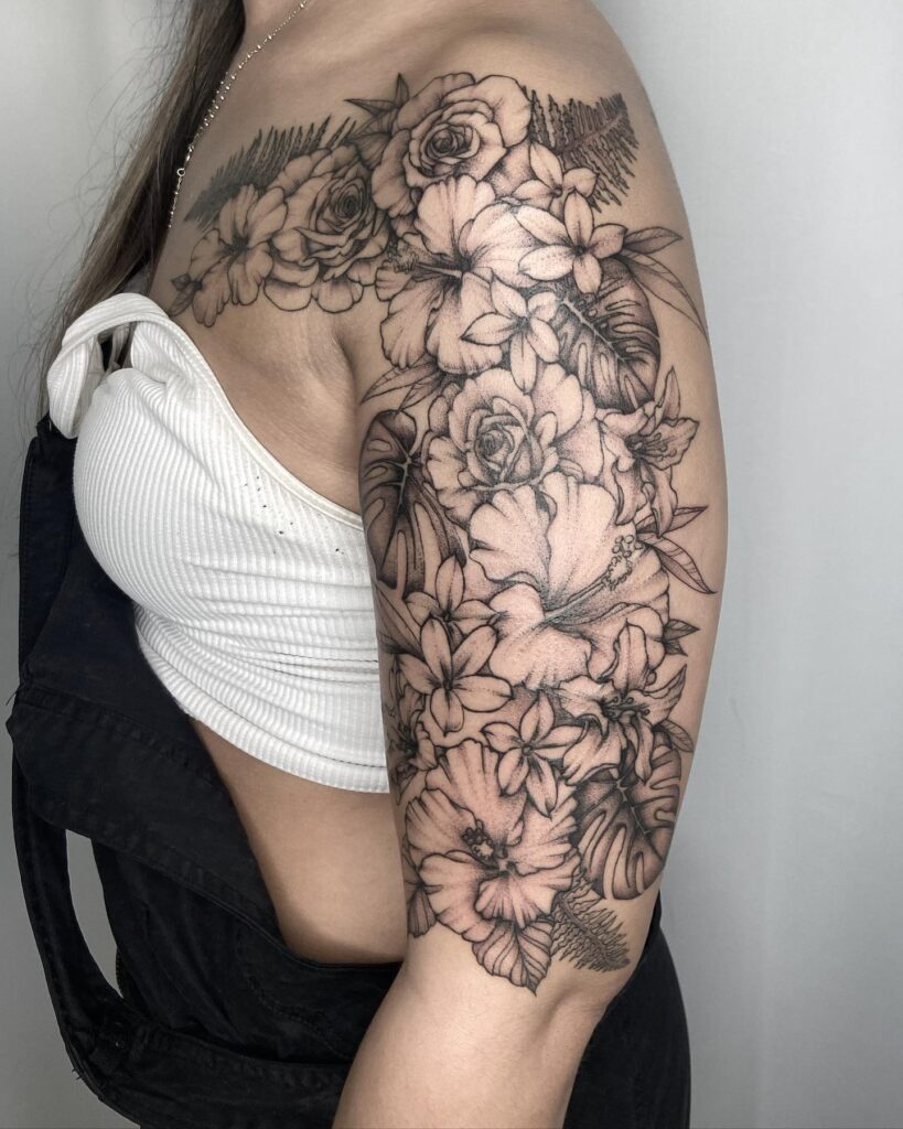 Flower frenzy arm and shoulder tattoo for women: a whimsical bouquet of beauty