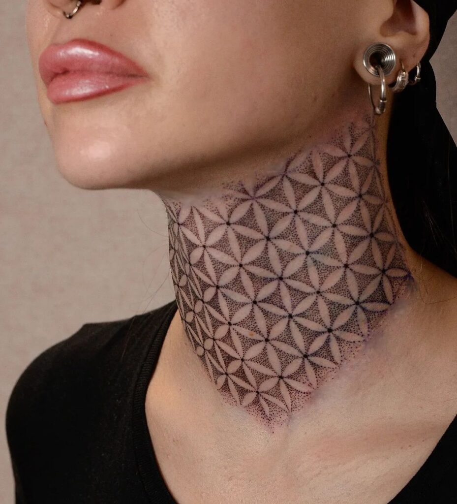 Flower of life majesty full neck tattoo embellished with the flower of life