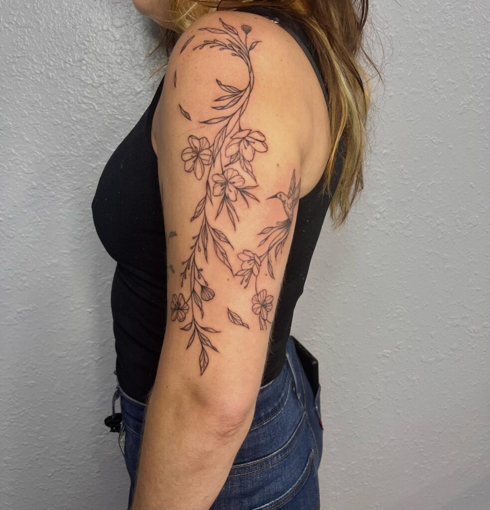 Flowy Flowers and Hummingbird Tattoo Half Sleeve Ideas: Graceful and Nature-Inspired