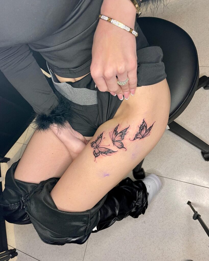 Fluttering beauty 3 small butterfly tattoo ideas on thigh for females