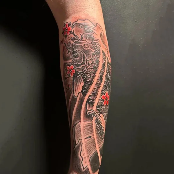 Forearm koi fish tattoo