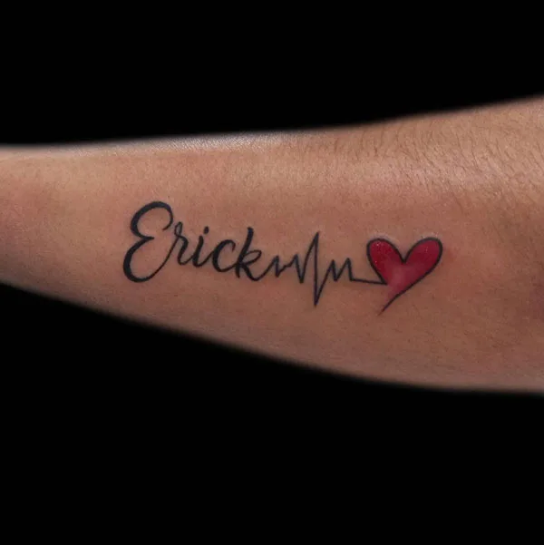 Forearm name tattoo