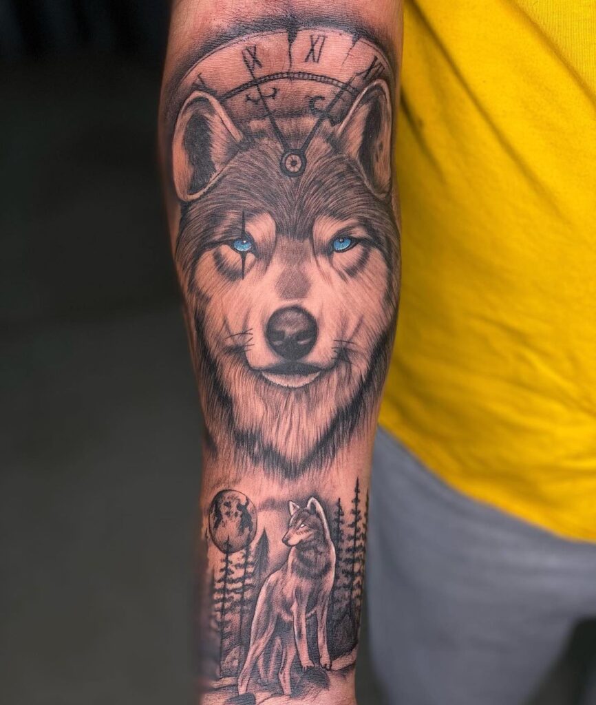 Forearm tattoo beauty the enchantment of the blue-eyed wolf in the forest with a clock