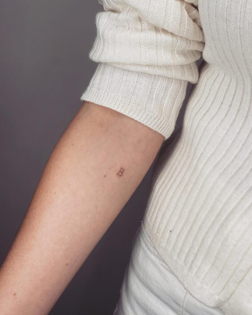 Forearm Tiny Letter 'B' Tattoo: Subtle Detail
