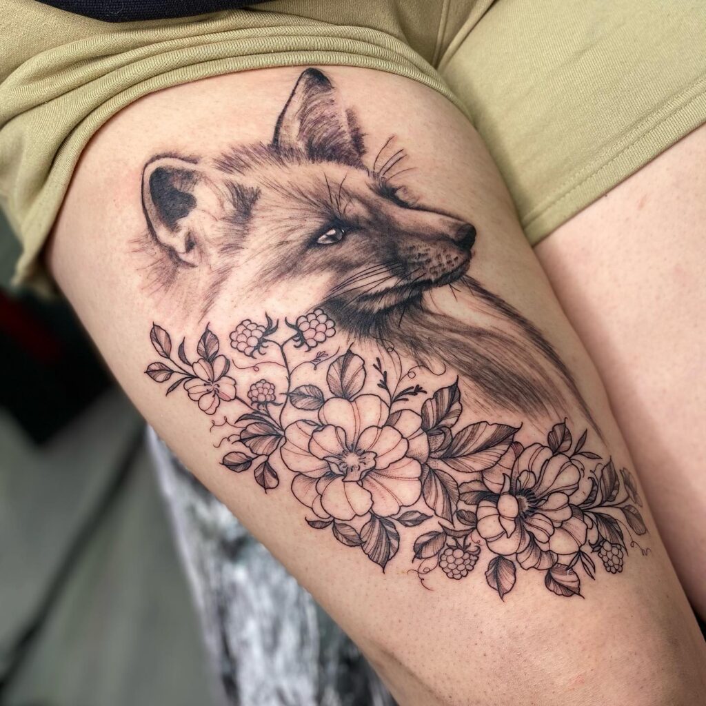 Fox Face with Florals Black and Grey Tattoo on the Thigh: Fluffy Whispers