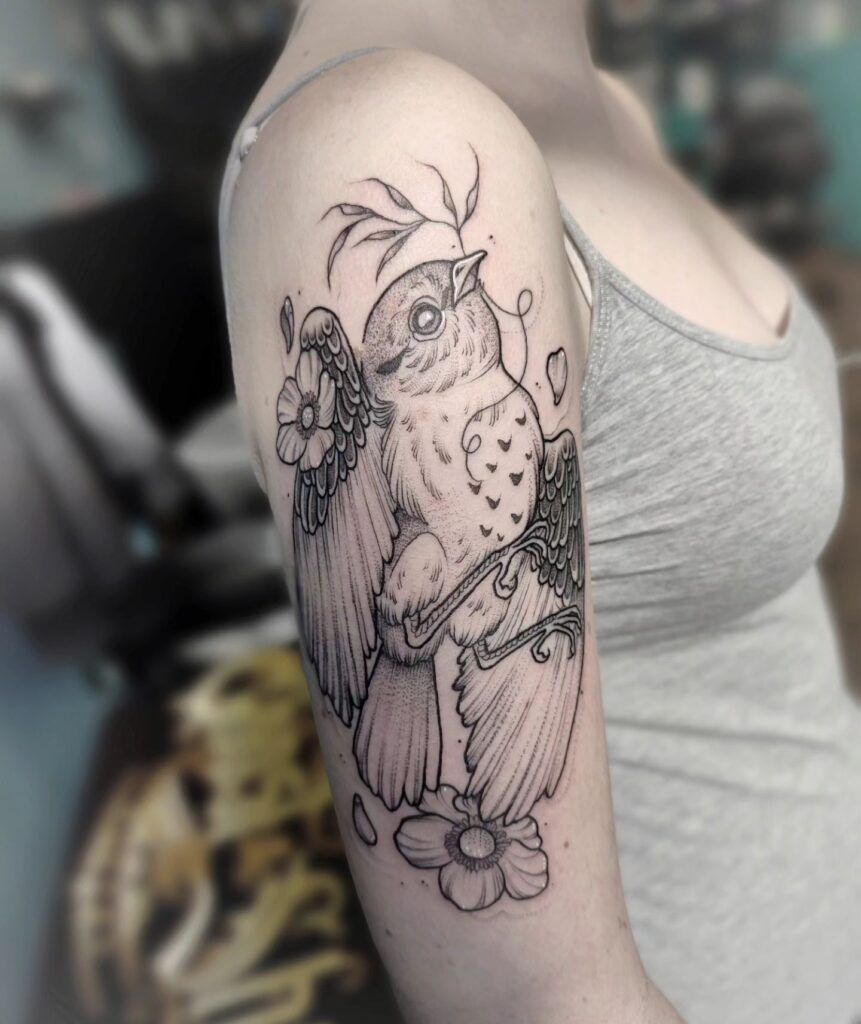 Free as a bird handcrafted bird and flower tattoo for the arm