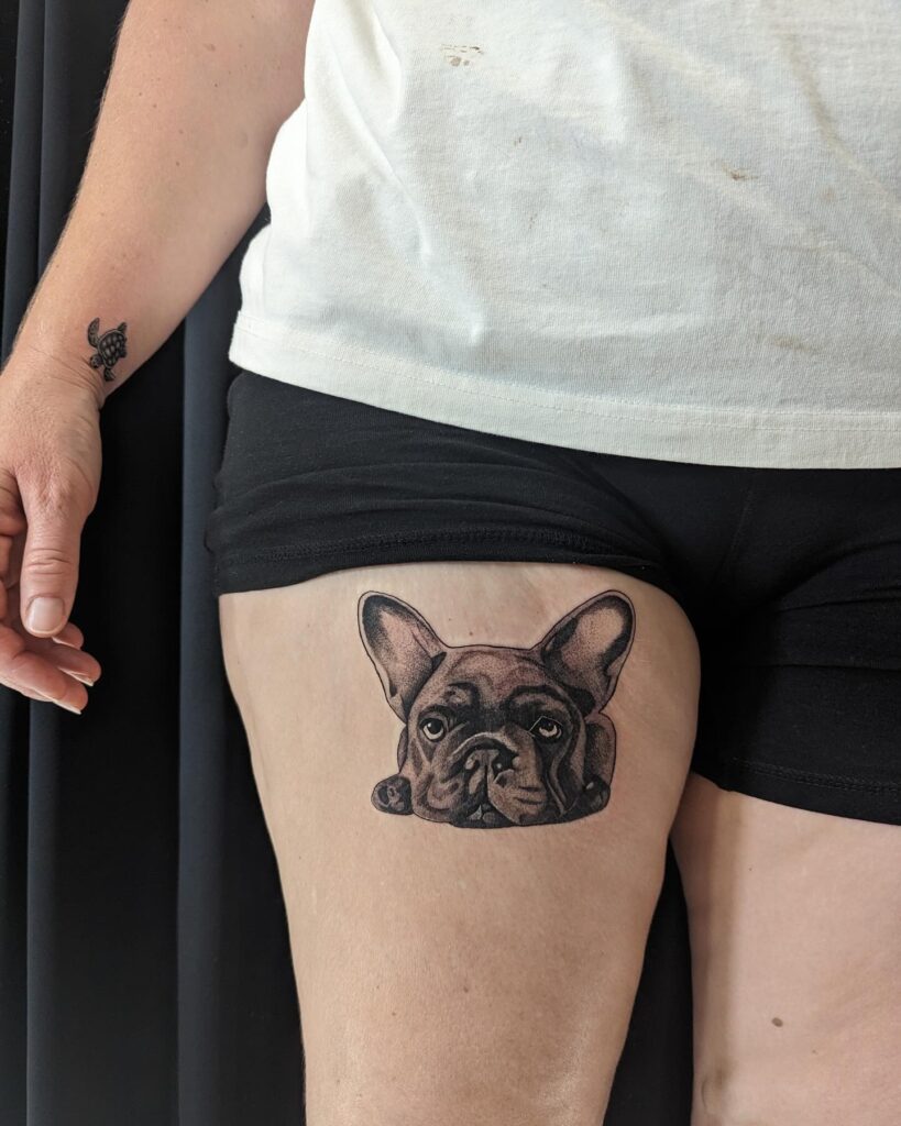 French Bulldog Portrait Tattoo on the Thigh for a Stylish Statement: French Chic
