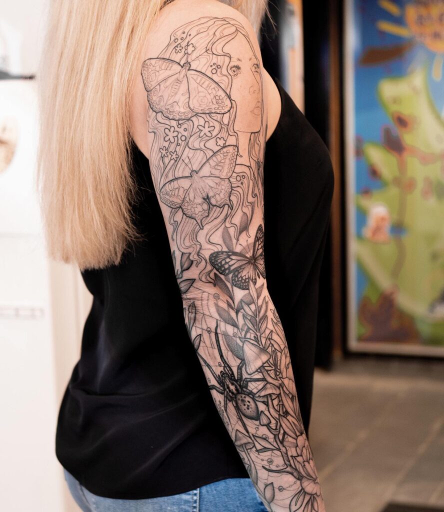 Full Sleeve Mother Nature Tattoo with Butterfly Motifs