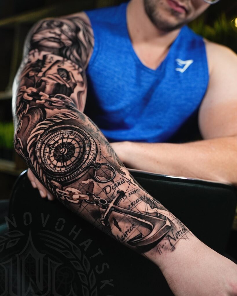 Full Sleeve Tattoo with Compass, Map, and Anchor Symbolizing Life's Adventures: Life's Cartography