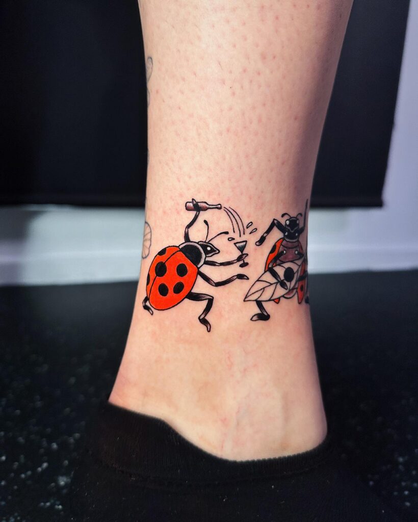 Fun Ladybugs Partying on Girl's Ankle: Playful and Whimsical Tattoo Art