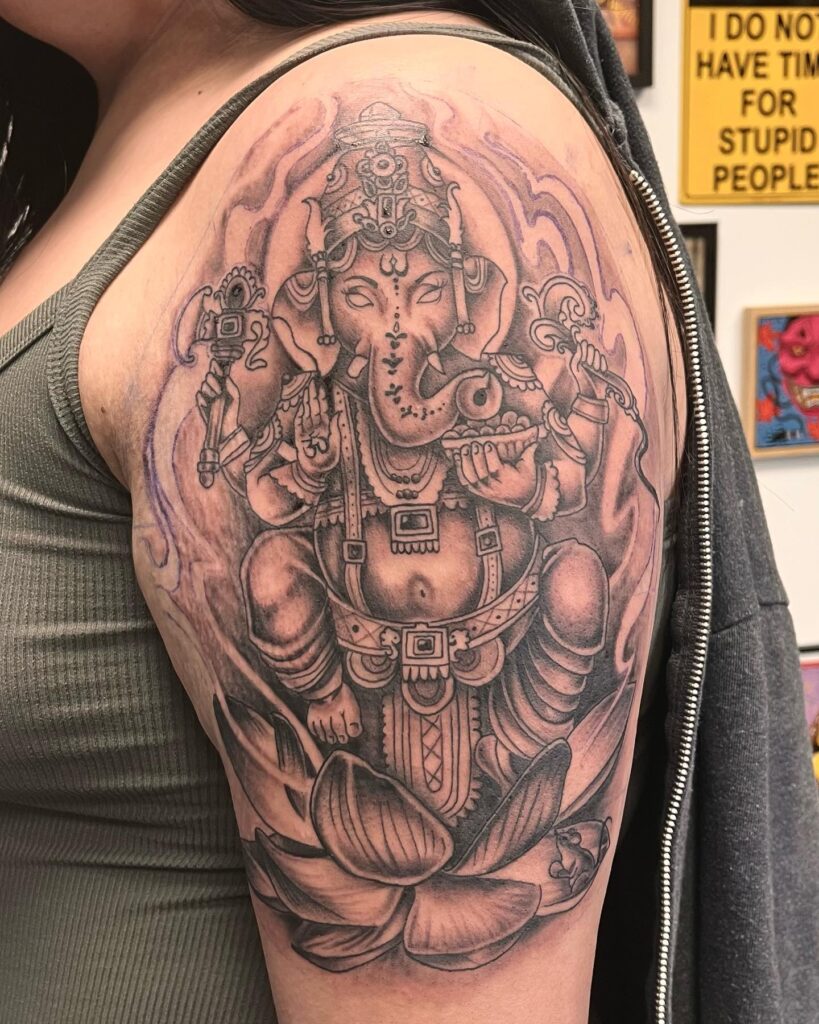 Ganesha Tattoo Half Sleeve Embracing Wisdom and Spiritual Growth