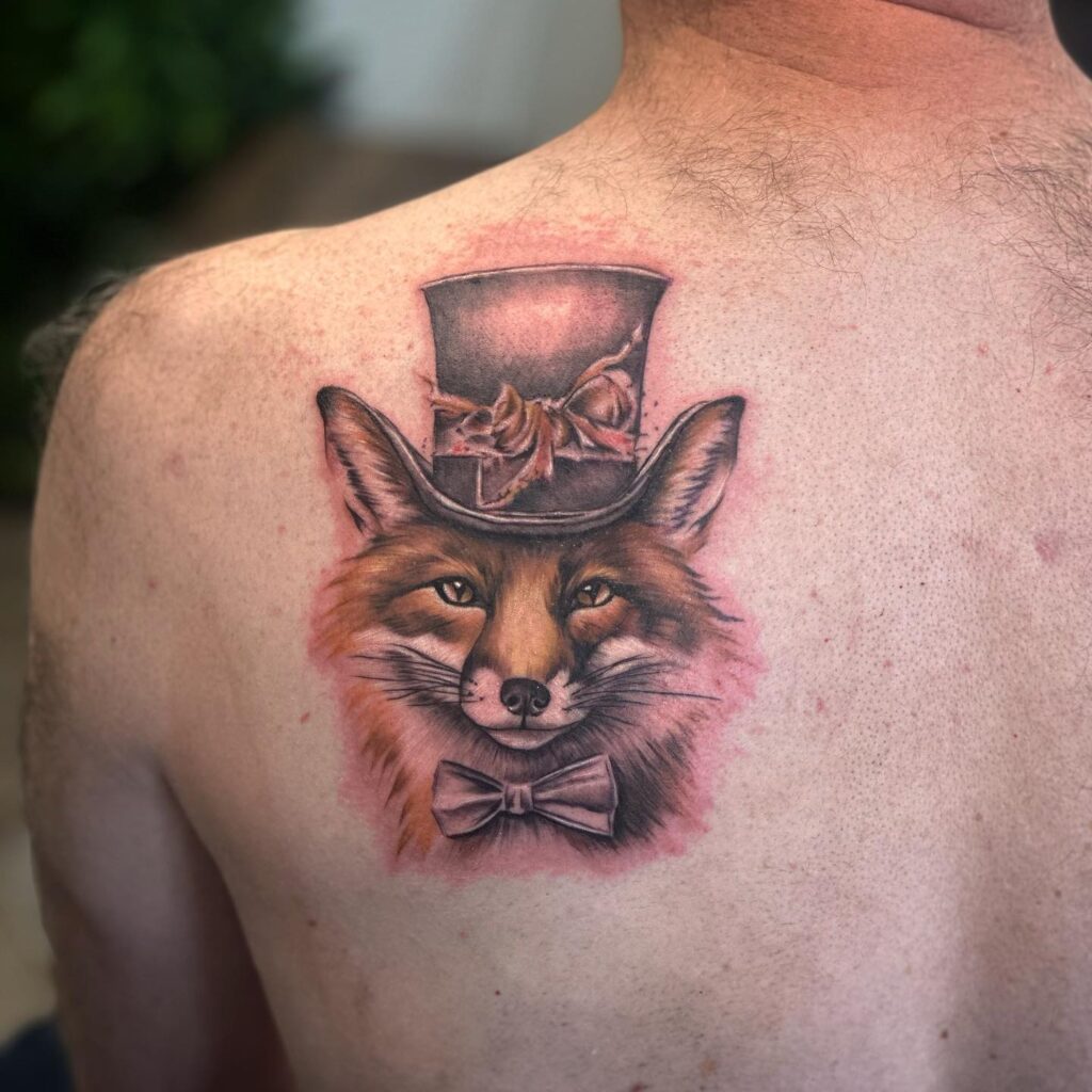 Gentleman Top Hat Tattoo on the Back of the Shoulder, Featuring a Fox Face: Dapper Details