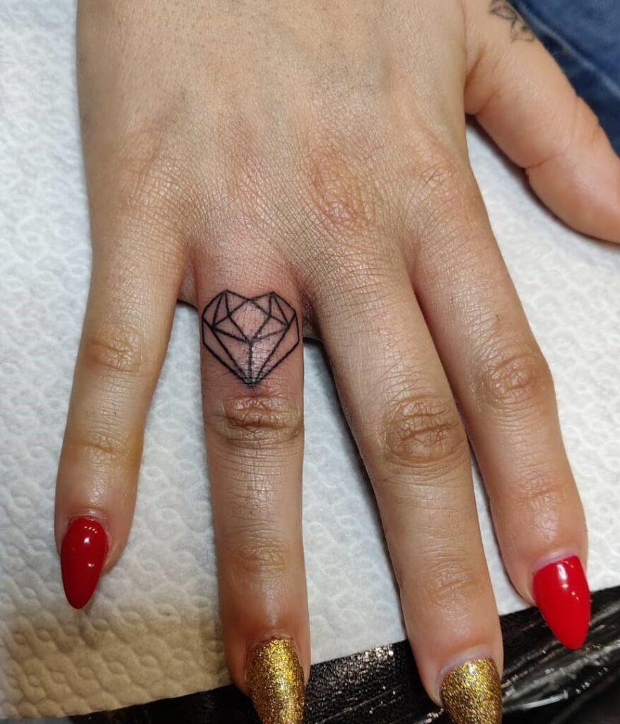 Geometric Love Heart Tattoo on the Ring Finger