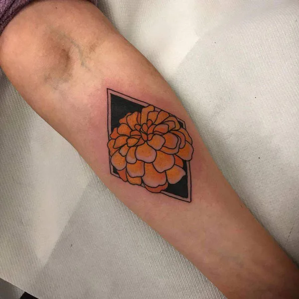 Geometric marigold tattoo 1