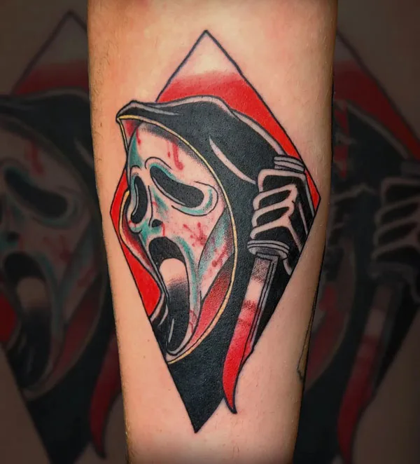 Geometric scream tattoo