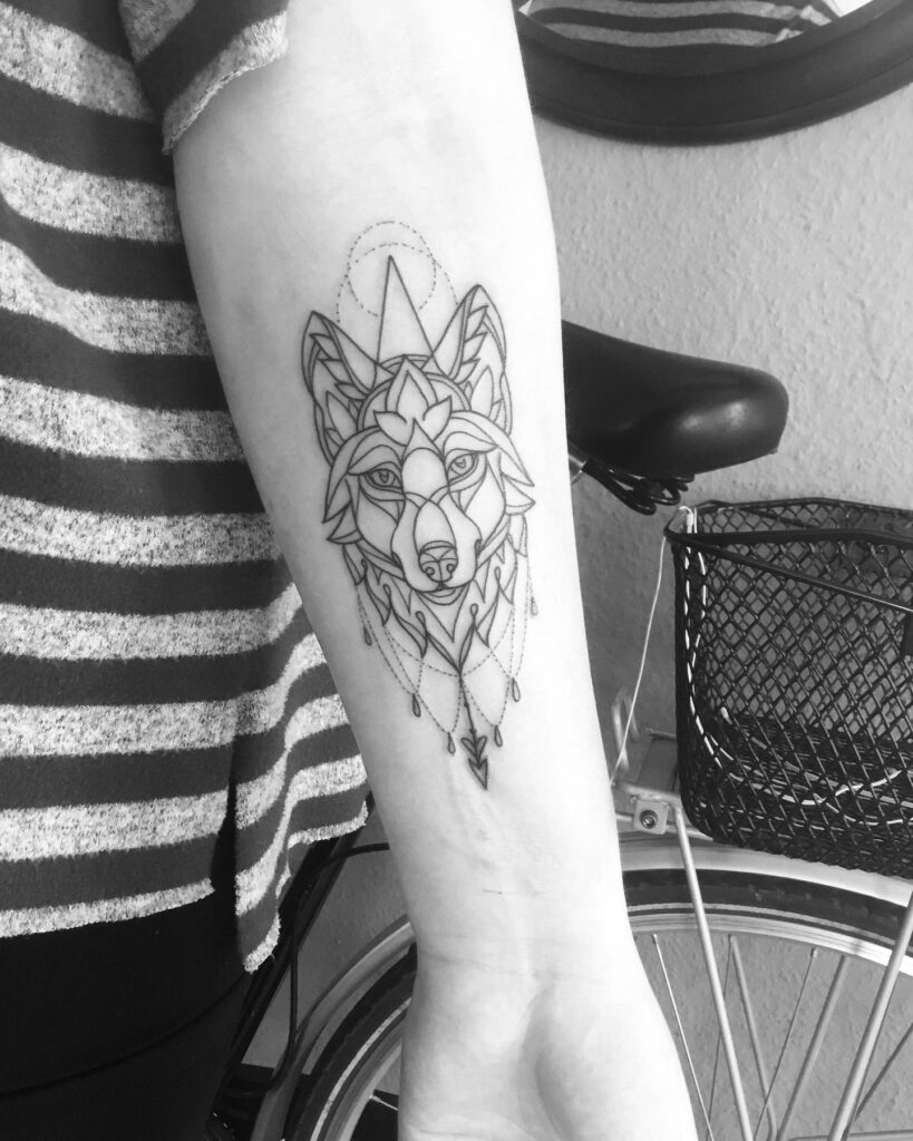 Geometric wolf tattoo forearm for men modern canine art