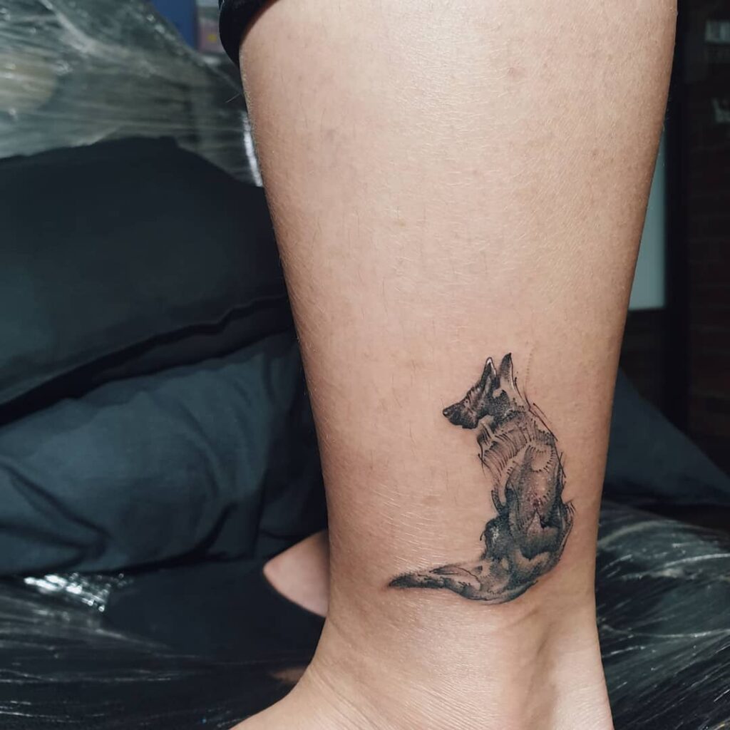 German Shepherd Tattoo Sitting Above Womens Ankle Detailed Canine Ink