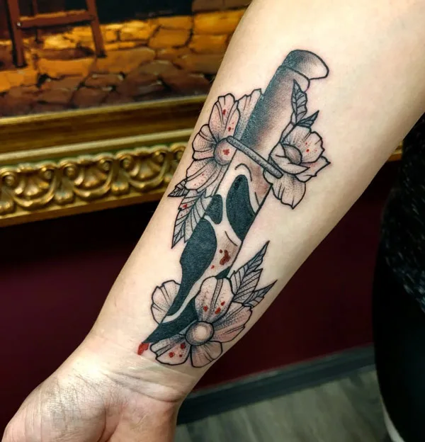 Ghostface knife tattoo
