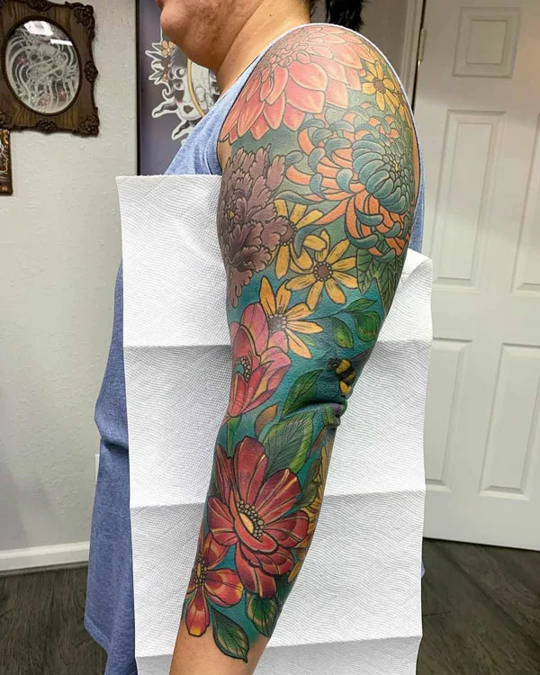 Glamorous flower sleeve tattoo design