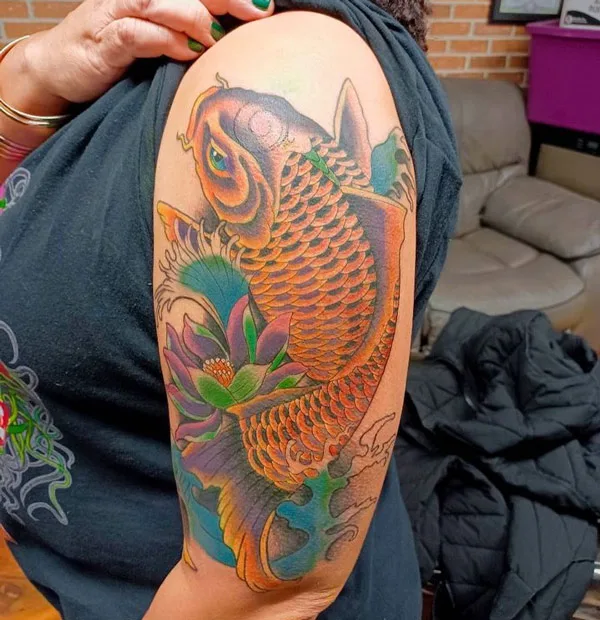 Golden koi fish tattoo