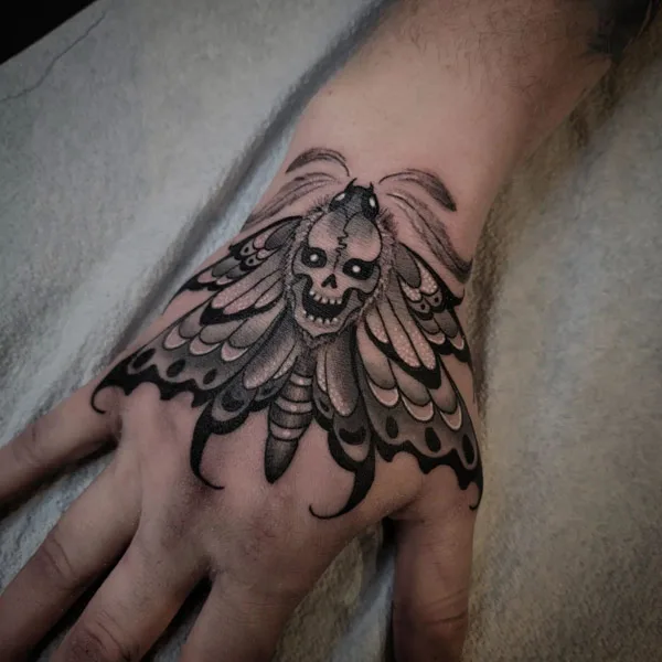 Gothic moth tattoo
