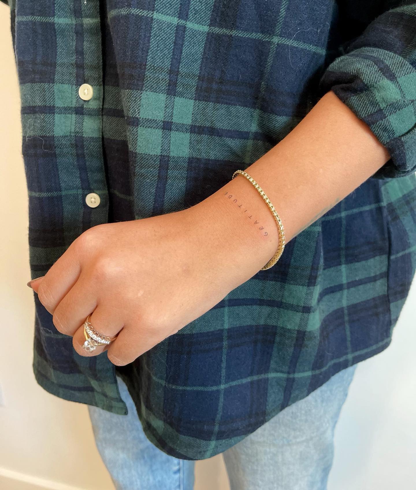 GRATITUDE Fine-Line Wrist Tattoo Elegant and Mindful Reminder