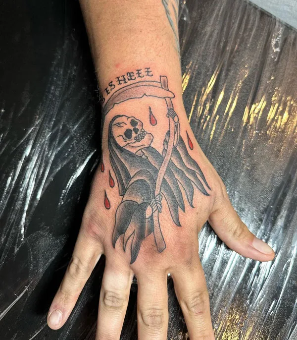 Grim Reaper Hand Tattoo 1
