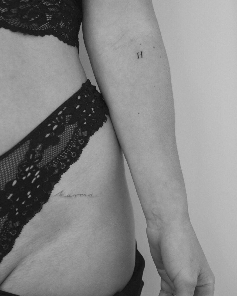 'H' Letter Tattoo Below the Elbow for Women: Feminine Flourish
