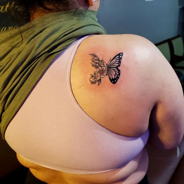 Half butterfly half flower tattoo 17