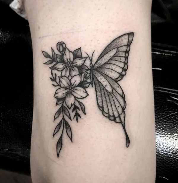 Half butterfly half flower tattoo 40