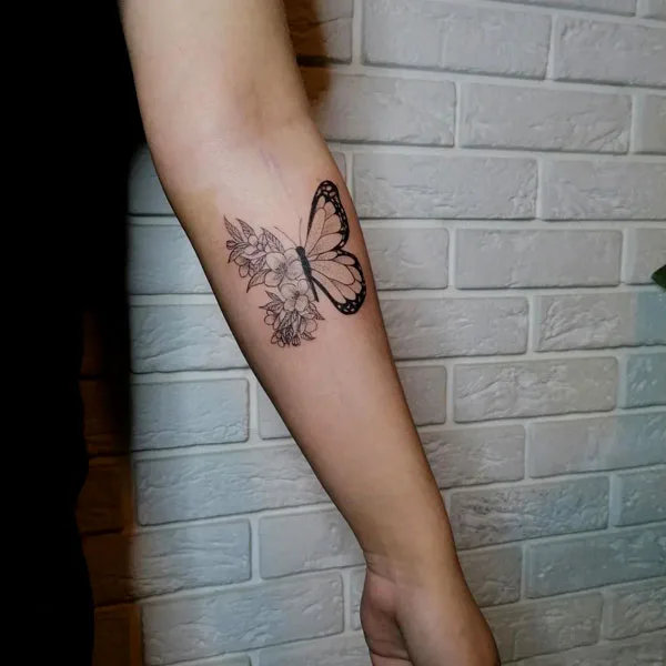 Half butterfly half flower tattoo 46