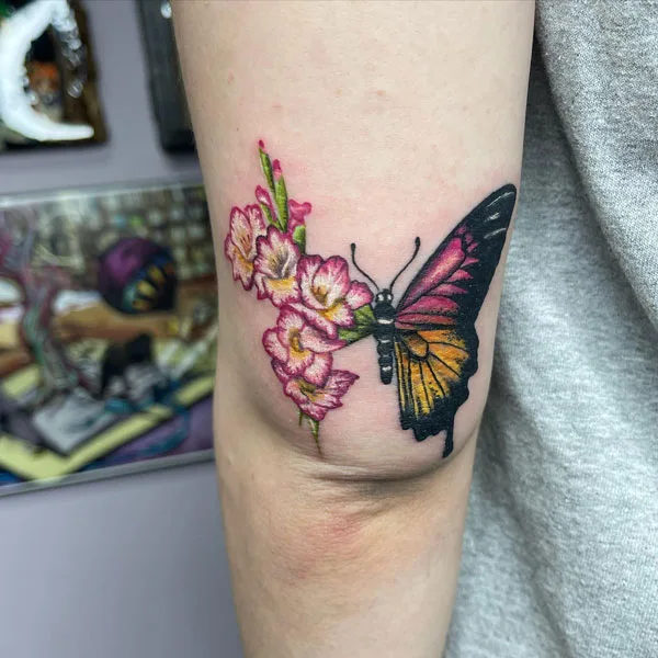 Half butterfly half flower tattoo 53