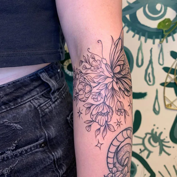 Half butterfly half flower tattoo 60