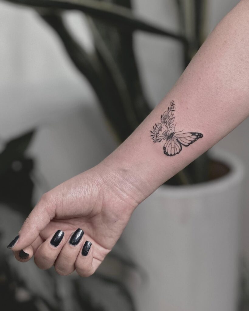 Half Butterfly, Half Flower Tattoo, a Symphony on the Forearm: Fluttering Beauty