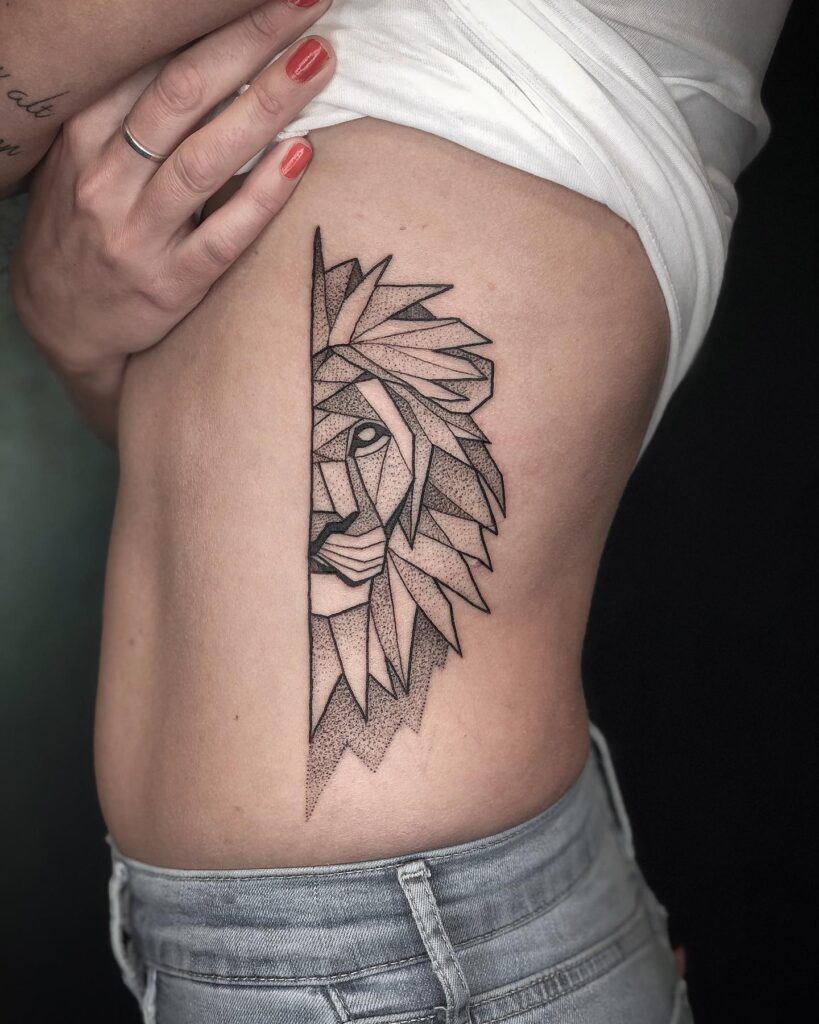 Half geometric lion tattoo on the rib: linework elegance in rib tattoo
