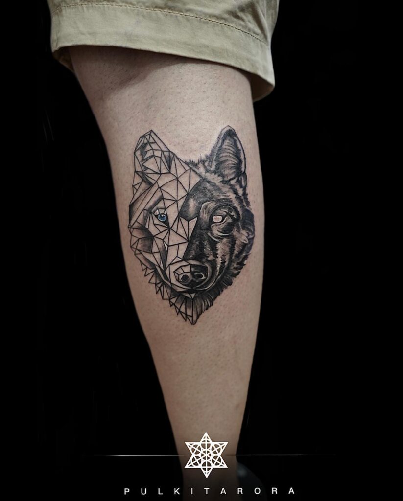 Half Geometrical, Half Wolf Head Tattoo on the Calf: Geometric Wolf Gaze 