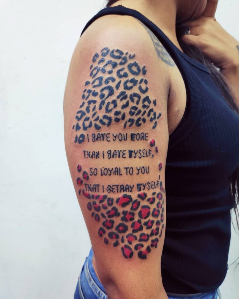 Half-sleeve beauty leopard print tattoo with inspiring quote for girls